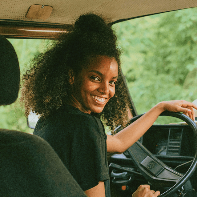 Person driving a car